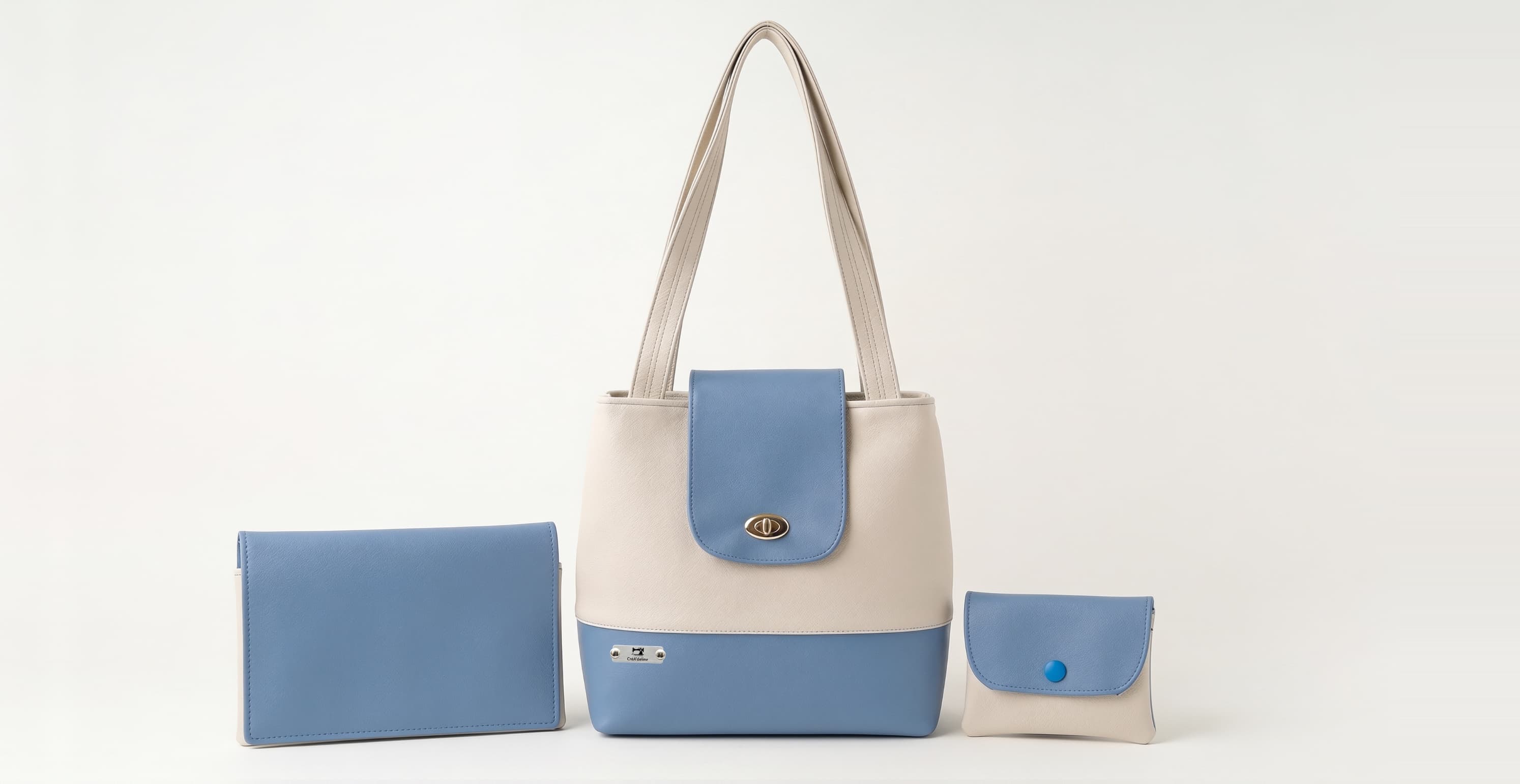 Sac cabas, portefeuille et pochette assortis, en simili cuir bleu et écru, CréA'deline